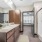 Large bathroom with vanity and oversized showers at Eclipse